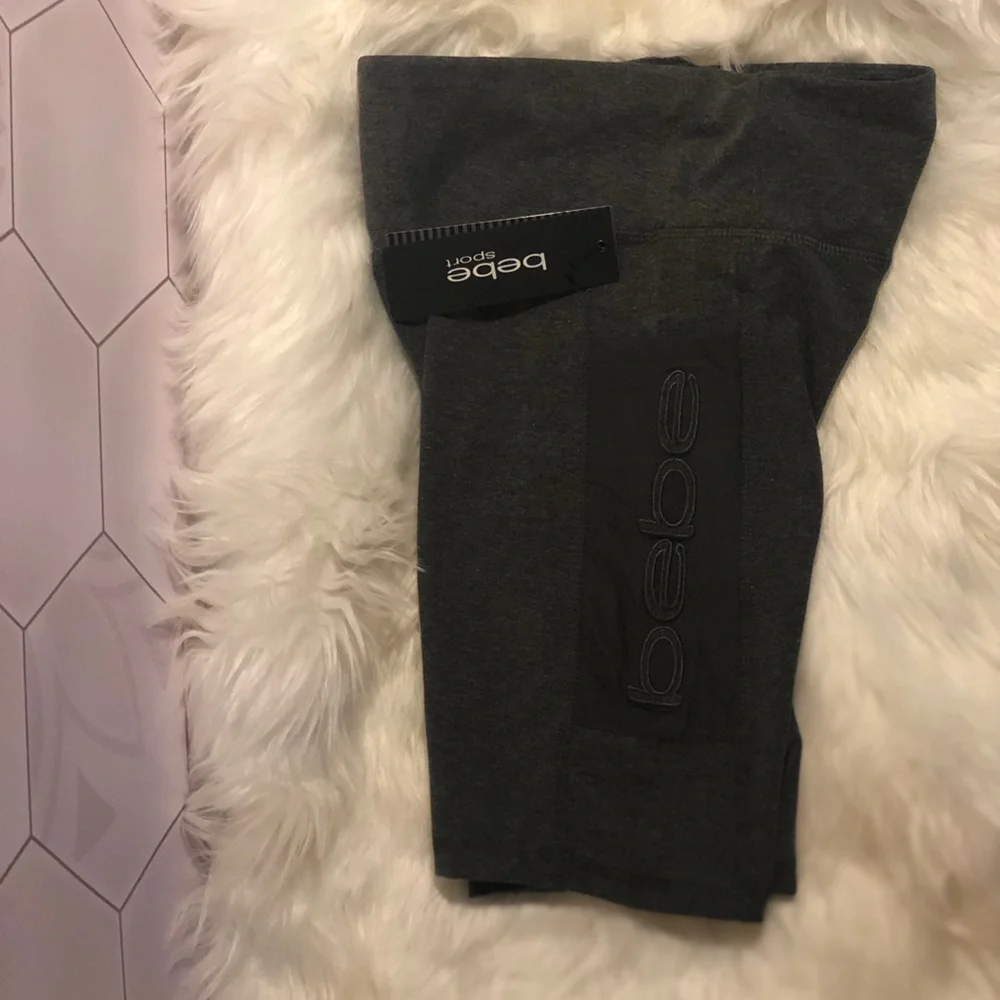 Bebe sport bike shorts with mesh pockets on both sides. Shorts are size small. - Picture 2 of 3